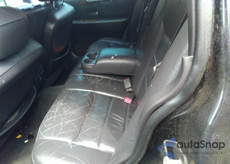 2000 Lincoln Town Car Executive z USA, uszkodzony, nr VIN 1LNHM81W3YY784675